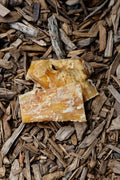 Beef Paddywack dog chew treats on natural wood chips